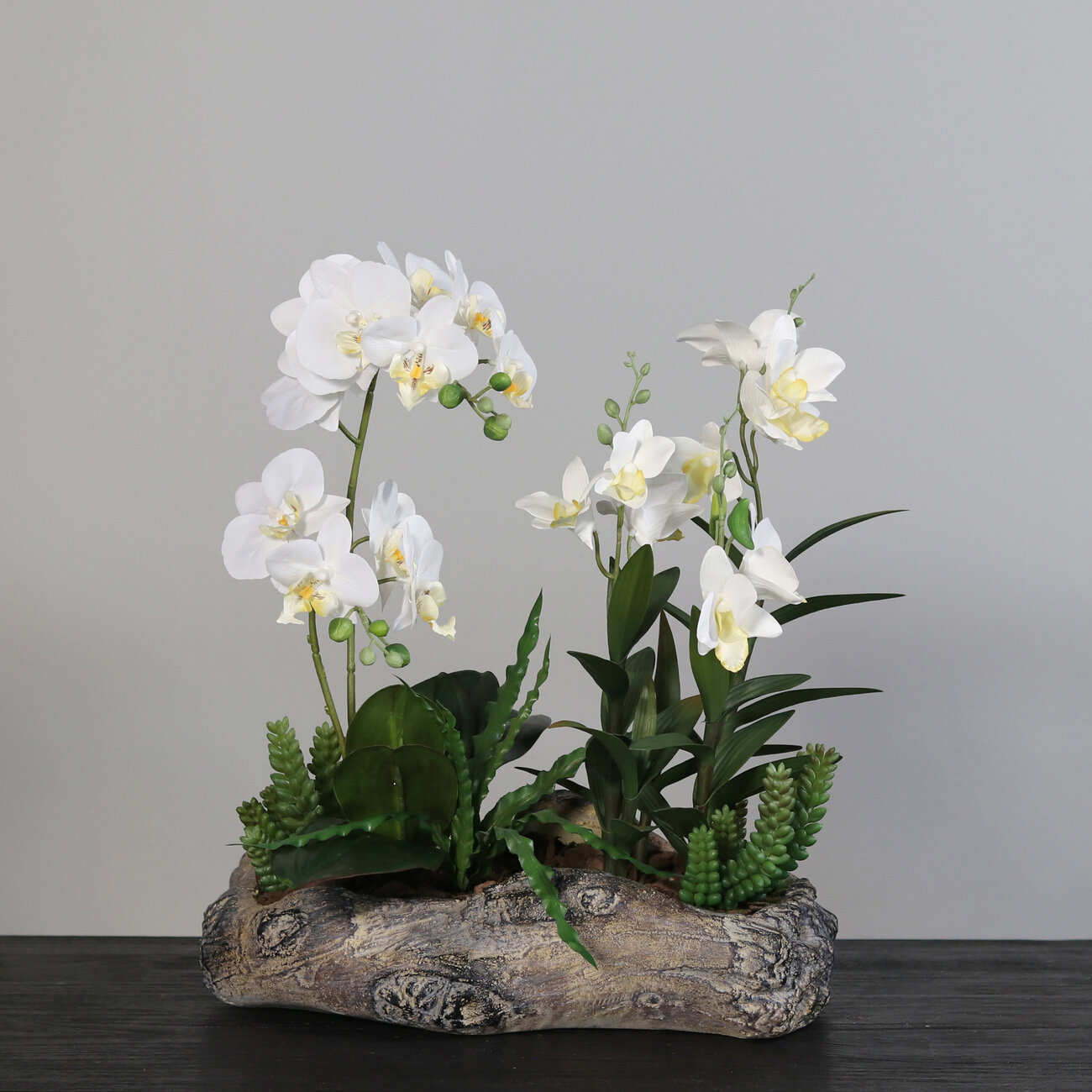 Künstliche Orchideen in Holz Schale